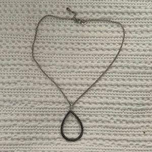 Teardrop shaped necklace “costume jewelry” silver in color
